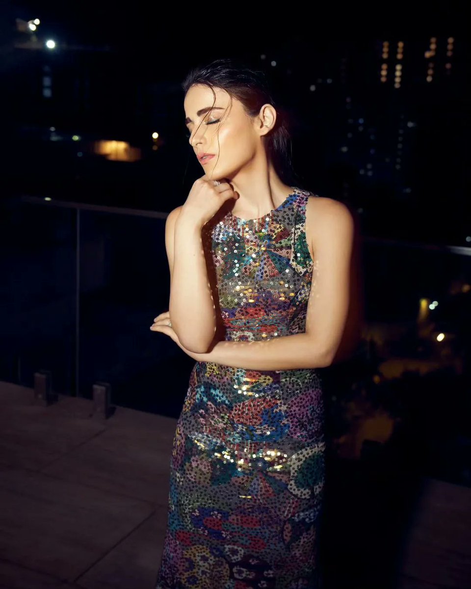 talkingbling's tweet photo. #RadhikaMadan, a luminous moon in her multicolored dress, casting a spell of beauty in the darkness. 🌙✨
. 
. 
. 
. 
#radhikamadan #CelebStyle #beauty #bollywoodfashion #fashionattire #divastyle #talkingbling https://t.co/1OHLifXdGE