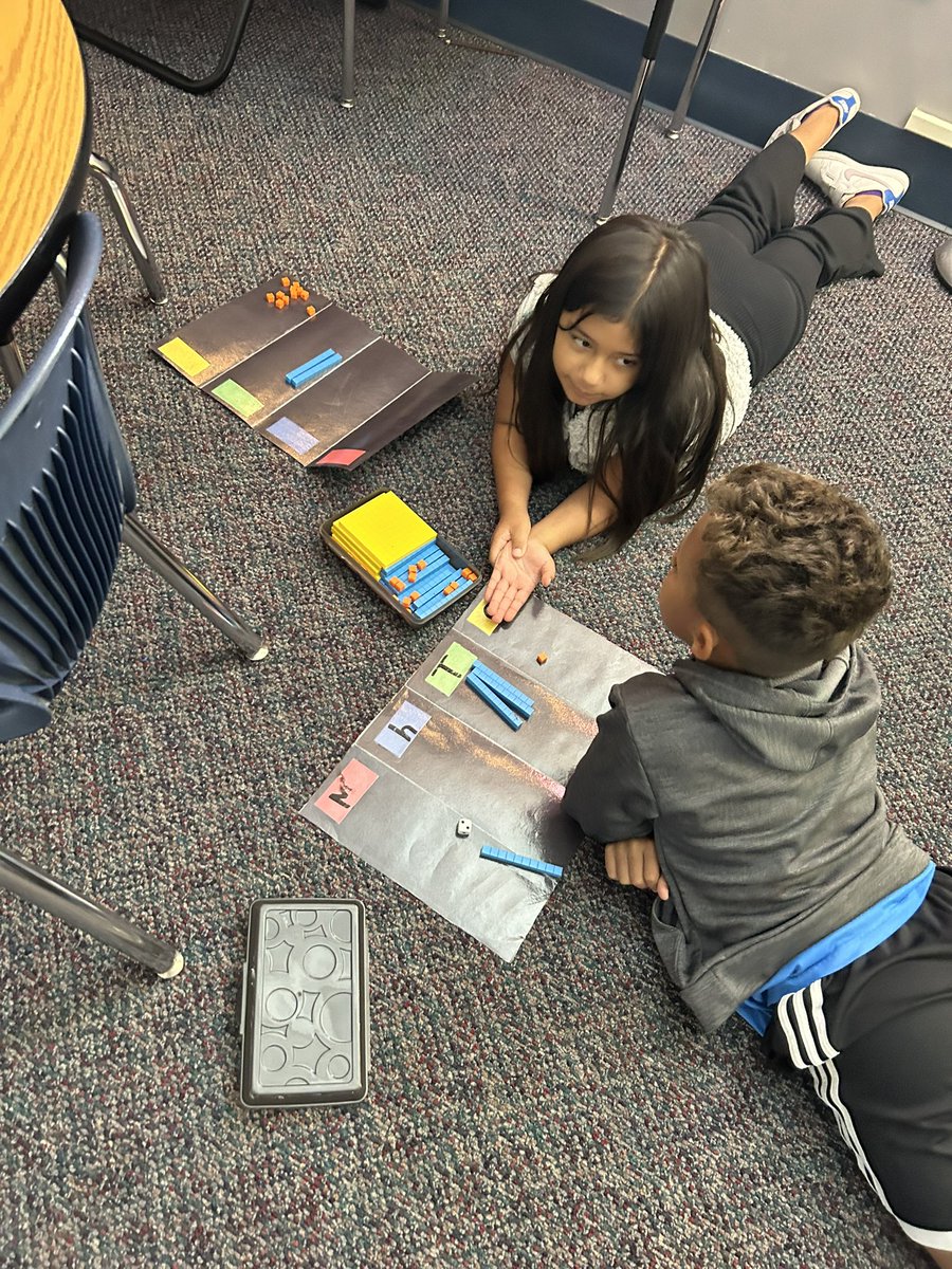 JamieG6708's tweet photo. My 2nd graders are learning all about place value! As we prepare for decomposing number next week, we are learning through a hands-on game that teaches the value of the digits depending on their position in the PV Chart. https://t.co/ItjhGxOgRZ