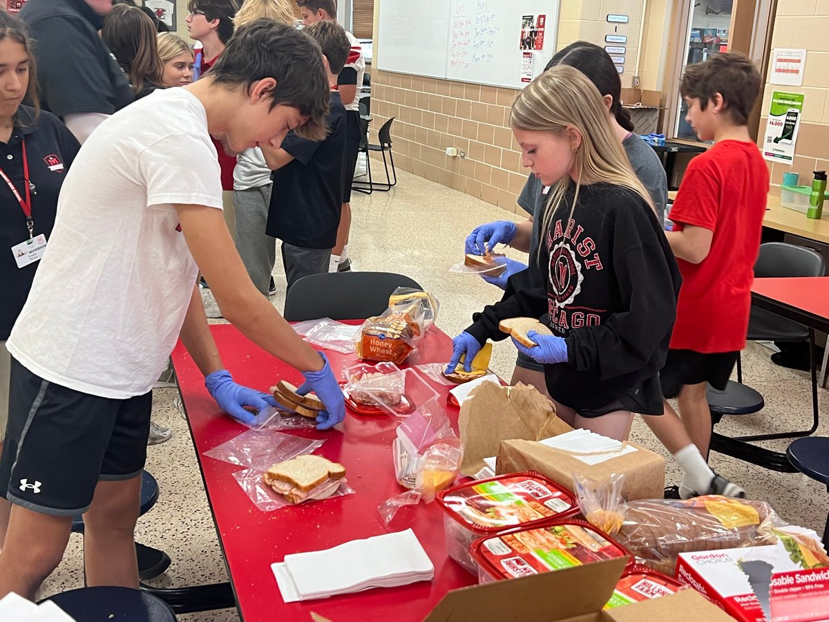 MaristHSalumni's tweet photo. As part of the Nutrition Unit and Health Planning lessons, students in Health class with Coach Heffernan ‘99 packed lunches for those in need. These packed lunches will go out this morning. These students are learning and doing good! #InTheClass #Marist https://t.co/7b7edJHjSn