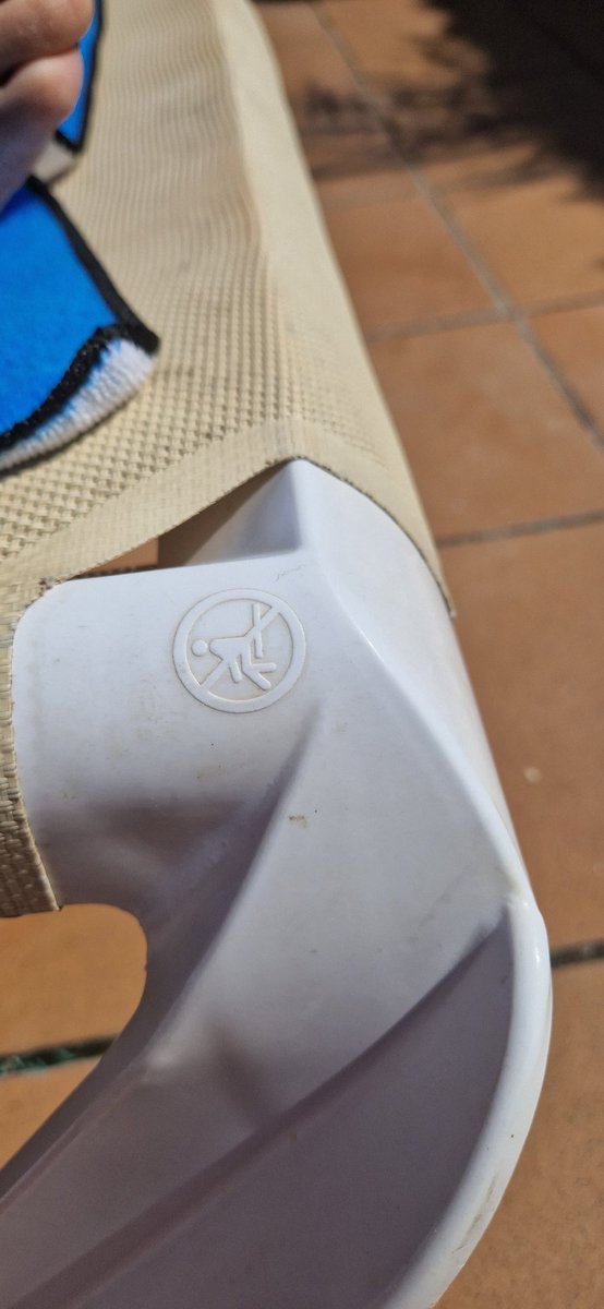 RedPMcG's tweet photo. WTF is this warning on my sunbed?? 🤔 lloret de mar what secrets are you hiding?? https://t.co/KuVIxmhbph