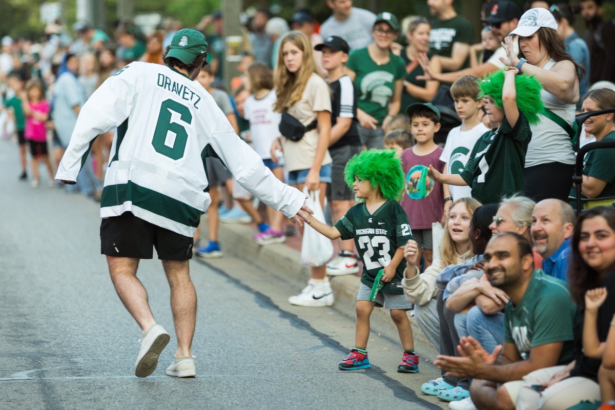 msualumni's tweet photo. Views from last night's @michiganstateu Homecoming parade! Thanks to Spartans near and far who joined us on campus for a Green and White celebration. #MSUHomecoming https://t.co/rXS6pdnIyd