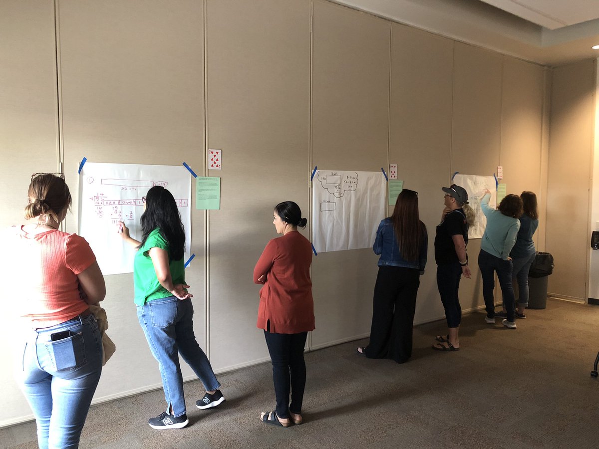 Saturday morning and engaging in Application Problems at vertical work spaces! <a href="/eureka_math/">Eureka Math</a> #buildingthinkingclassrooms