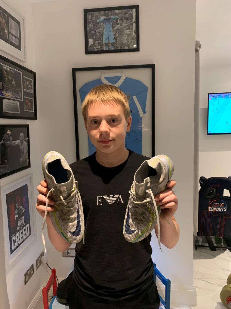 Chris5Powell's tweet photo. Thanks to @benwoods101 of @SRFCofficial following the game at https://t.co/dLkxYCH3J5 today v @thesilkmen gave his boots to Aston, U14 @thesilkmen player. Fair play and thank you. ⚽️👏 https://t.co/Ee3FzJqrh5