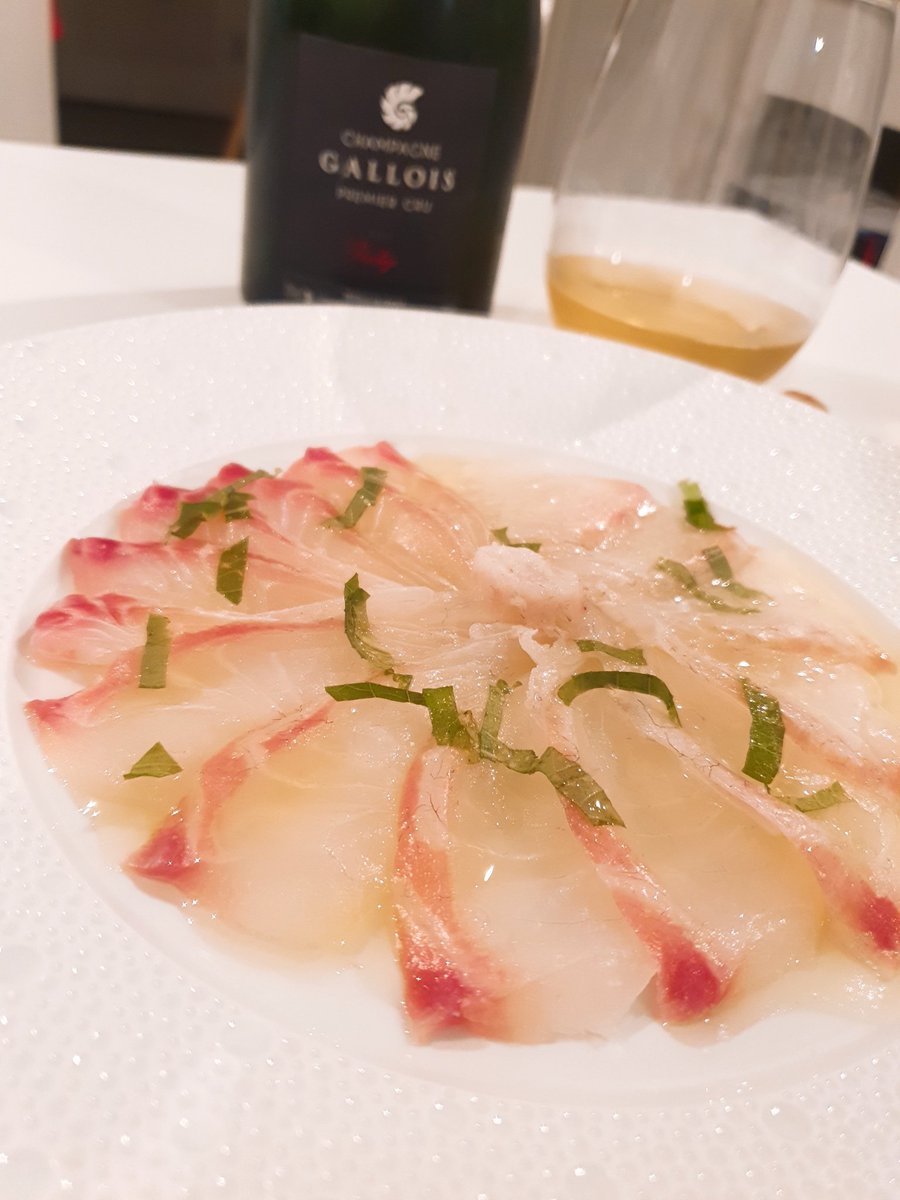 Sea bream, shiso, salt, olive oil. #sergegallois #champagne #premiercru #prestige celebrating the first fish importation of #keitaseafood.