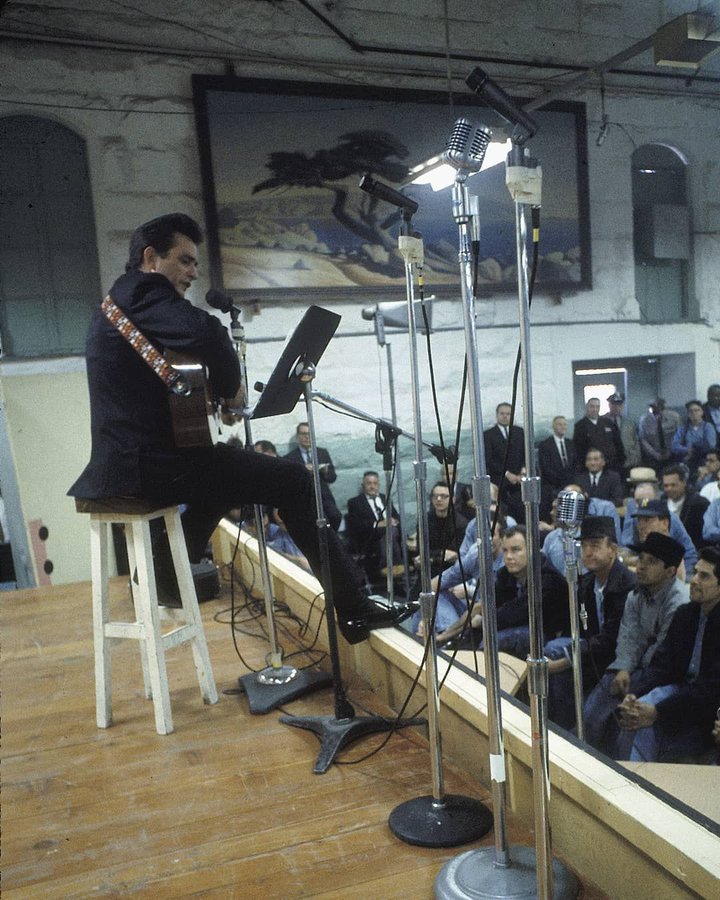 Johnny Cash performing for prisoners at Folsom Prison, January 13, 1968. Photo by Jim Marshall
