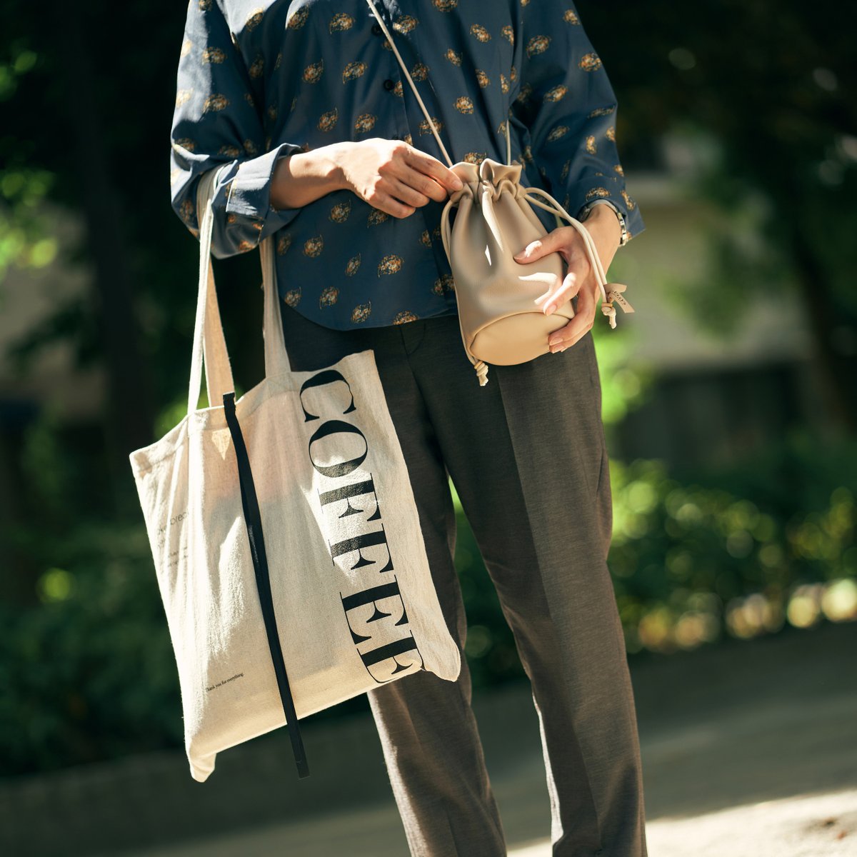 Balletto di prima アイボリー巾着ポシェット ダブル使いもおすすめ😉✨ 肩掛け出来て携帯バッグにぴったり、 巾着