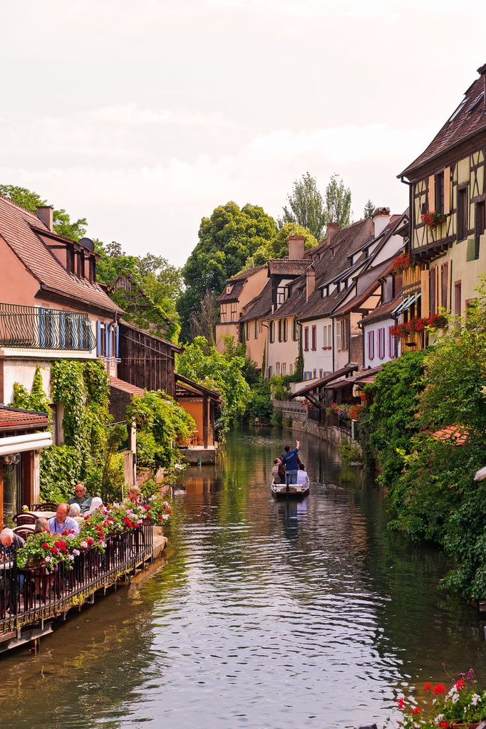 Colmar: A fairytale town in Alsace, France, where colorful half-timbered houses line the canals, inviting you into a storybook setting.