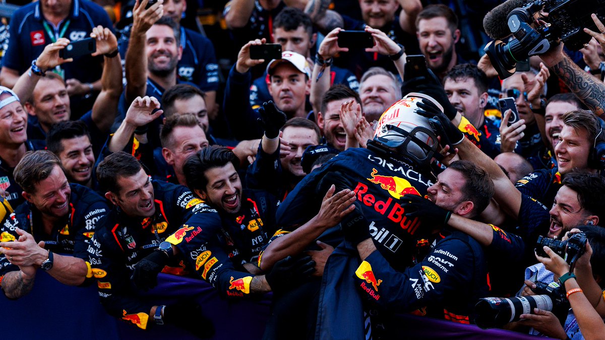 Max Verstappen celebrates with Red Bull team