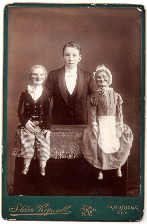 V is for Ventriloquist Dummy in our #MuseumABC. Pictured below is Vernon Cross of Ely with his two ventriloquist dummies. Cross worked as a magician’s assistant and ventriloquist in his youth and his passion for the stage continued into adulthood.