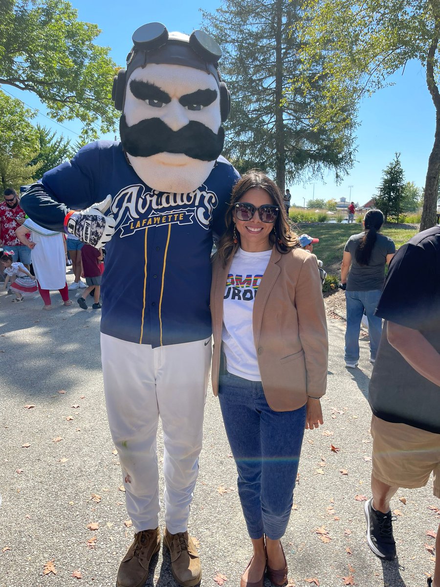 Purdue's College of Education and PILAR project joined the Tippecanoe Latino Festival to champion Latino, Latina, and Latinx representation in elementary education. Here's a snapshot of Dra. Sarmiento-Quezada with Ace, the Lafayette Aviators baseball team mascot.