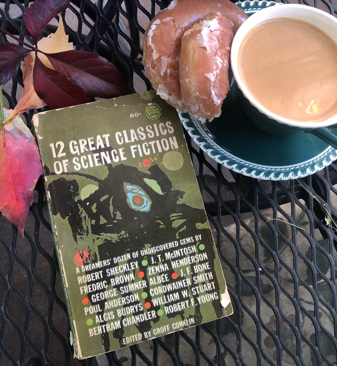 Beautiful fall day here in Colorado. Krispy Kreme Pumpkin Spice and some terrific sci-fi. Just love these old anthologies. Thanks @ProfessorAlan ! #scifianddonut