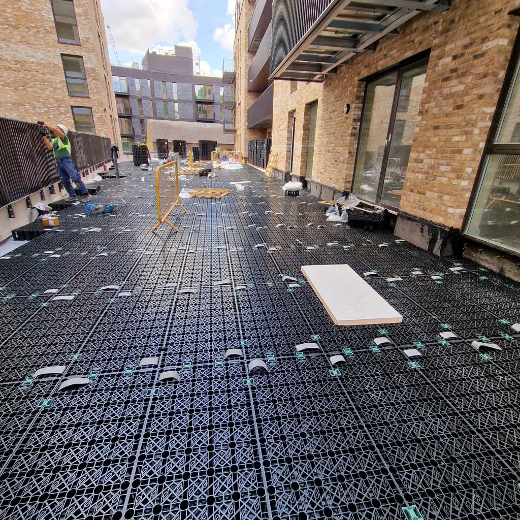 df_roofing's tweet photo. The Blue Roof was added to the project very late during construction due to issues with down stream attenuation. This caused some challenging design issues that we helped overcome. #blueroof #landscaping #greenroof https://t.co/ruI0rOdEFu