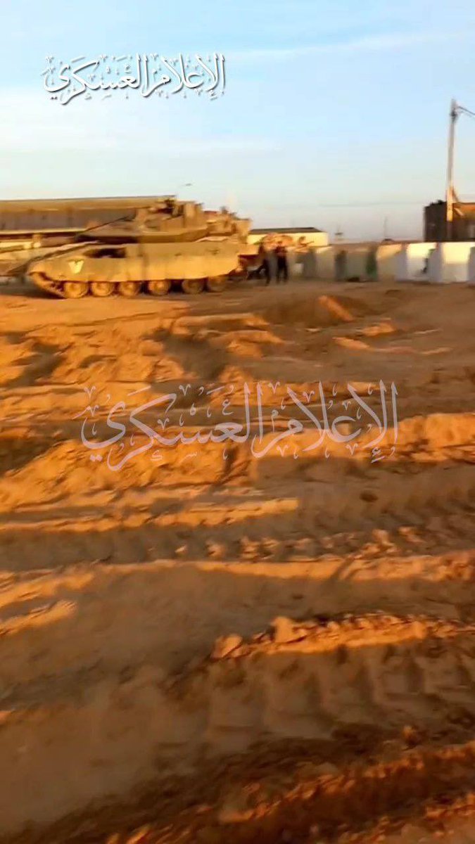 sentdefender's tweet photo. Hamas has reportedly Captured a Merkava Mark IV Main Battle Tank and at least 1 Namer APC after they Overran an Israeli Military Base near the Gaza Strip. https://t.co/NgJKrv5hOg