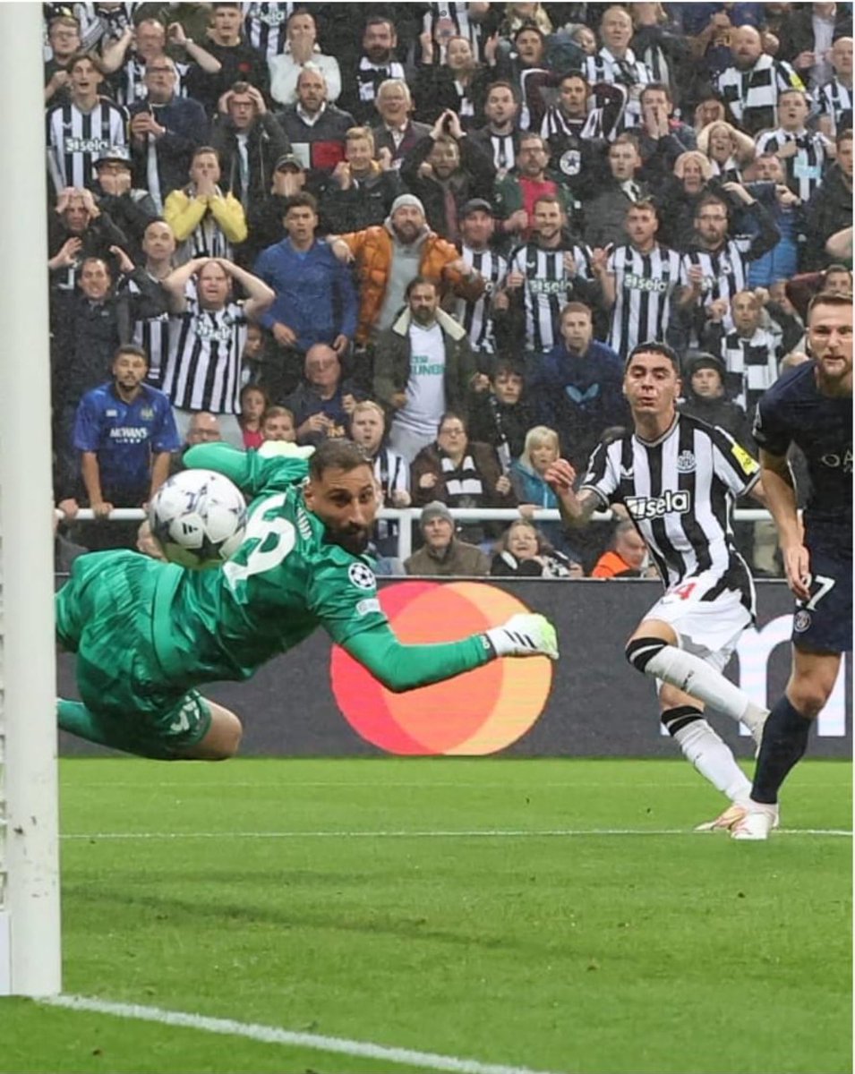 Zoom in on the fans in the background, taken just before the ball hits the net #NUFC