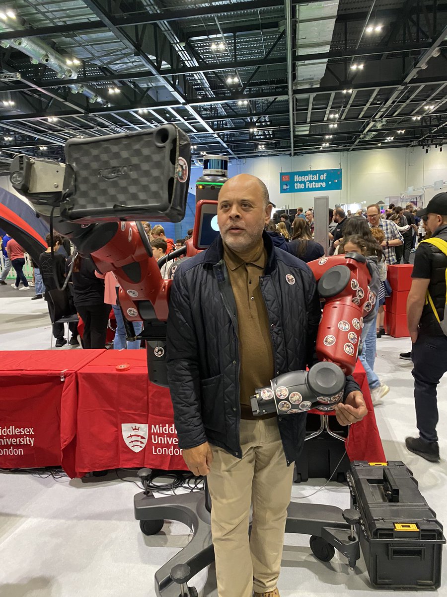 Having a hug with a friendly MDX robot at Excel. No really…..