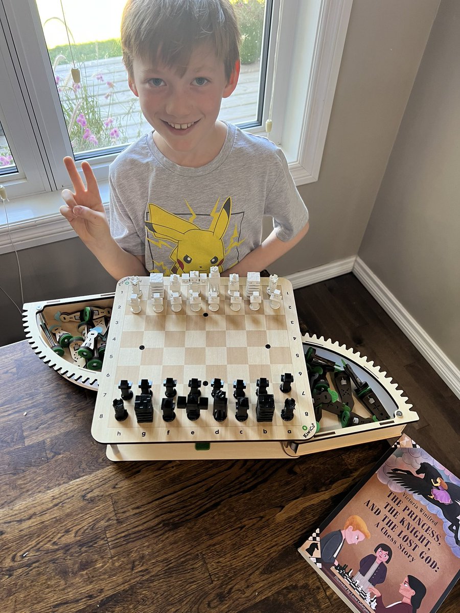 My son with his <a href="/kiwico_inc/">KiwiCo</a> geared chess board. Great package as always and we had a blast putting it together. Featuring the Minecraft chess set he helped me design, print and paint! (cults3d.com/:1458508). He wanted to put <a href="/writer4kids/">VictoriaWinifred</a> book in the picture too, great read!