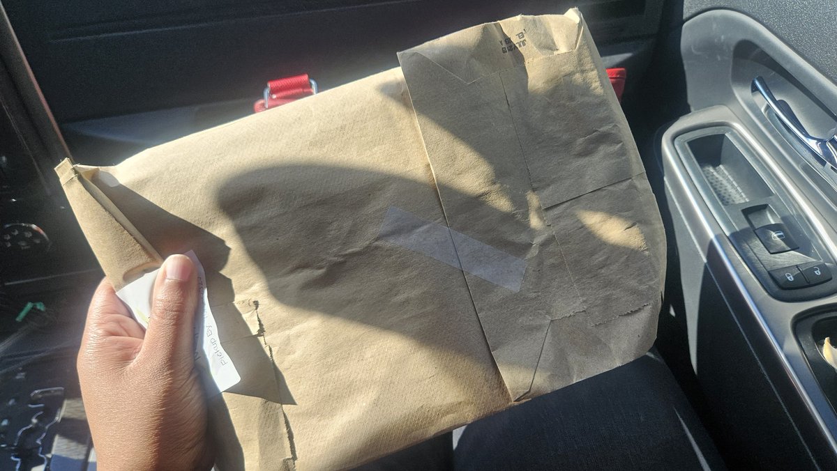 Picked up a book I put on hold at my mom's library and it came in a brown paper bag!! Like something illicit or ::gasps:: banned