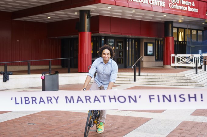 UKLaureate's tweet image. Our wonderful @UKLaureate
@JosephACoelho
has completed his #LibraryMarathon with the final and 213th library, the iconic
@britishlibrary. Here's Joseph cycling through the finish line on his homemade bamboo bicycle - what an epic journey it's been #LibrariesWeek
@Booktrust