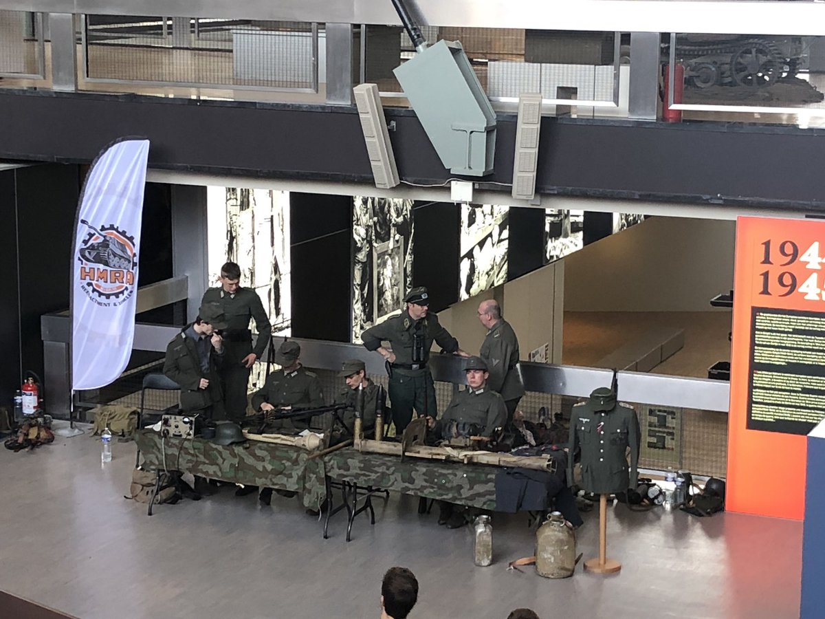 NFPick's tweet photo. @WeHaveWaysPod Trip to Belgium and took in the military museum, some living history, including what looks like a Wehrmacht recruitment drive 😳 https://t.co/GmHAmG4vlx