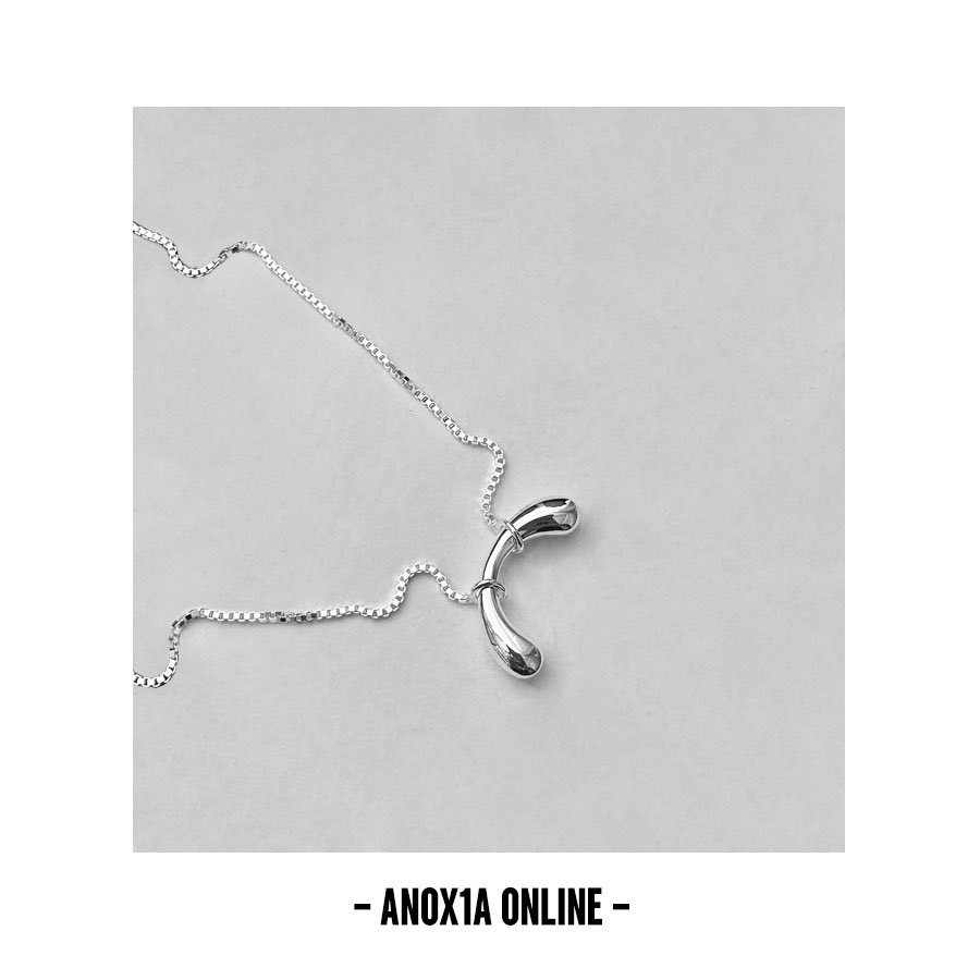 The perfect combination of modern minimalism and playful elegance with S925 Silver Necklace. The elongated arc pendant adds a subtle twist to the conventional design.#an0x1a #an0x1aonline #S925SilverNecklace #ModernMinimalism #PlayfulElegance