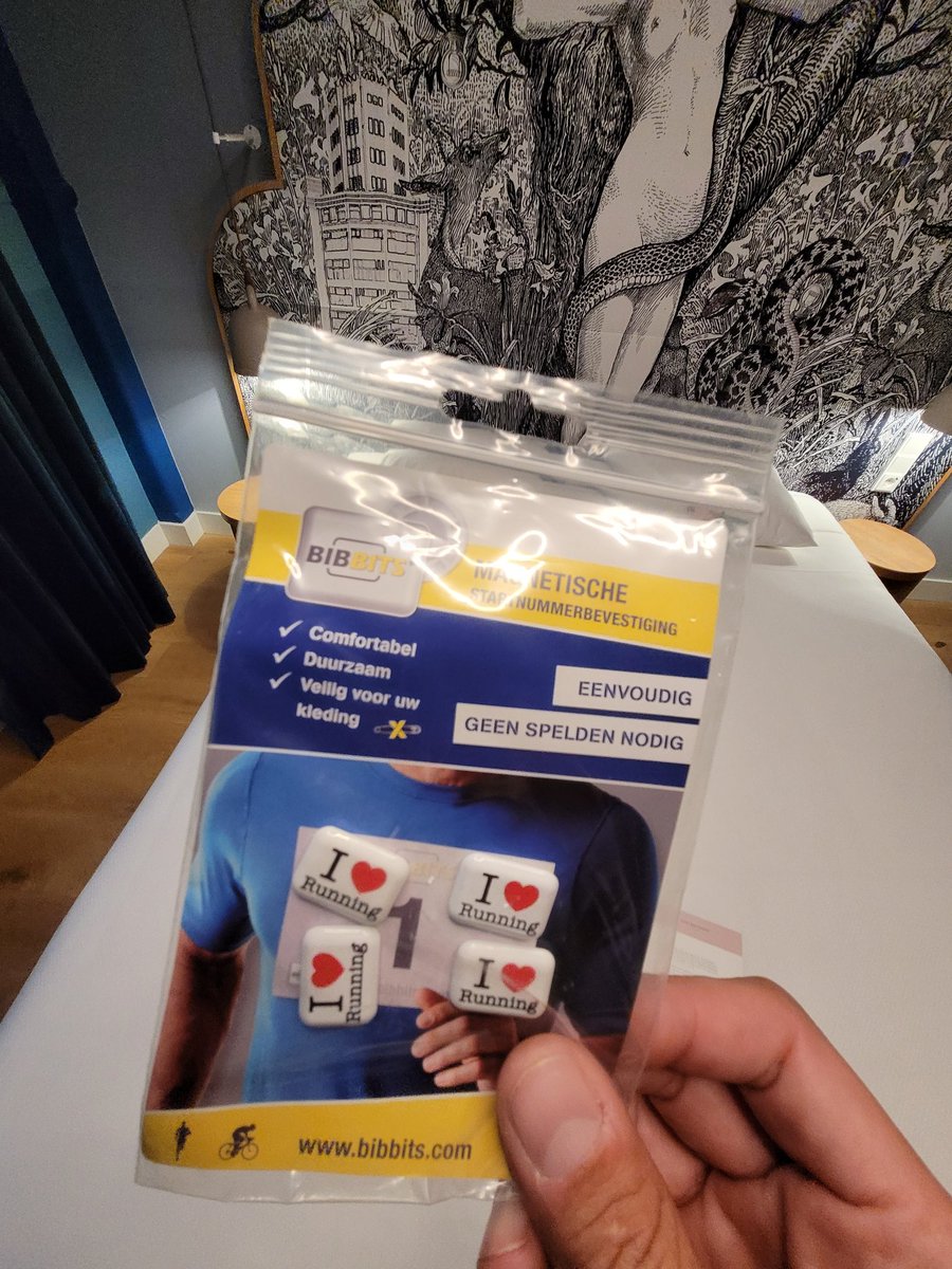 Hotel next to the office, right near the finish line. Room is really nice, huge bed, huge bath, rain shower, race number magnets, too! 👌