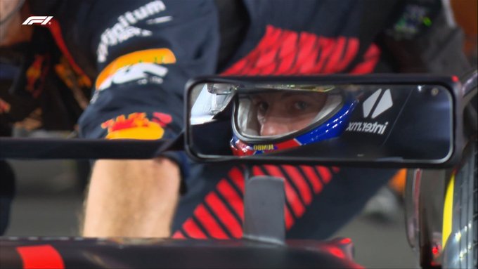 A photo of Max Verstappen's eyes through his visor, shown in the reflection of his mirror before the Sprint in Qatar