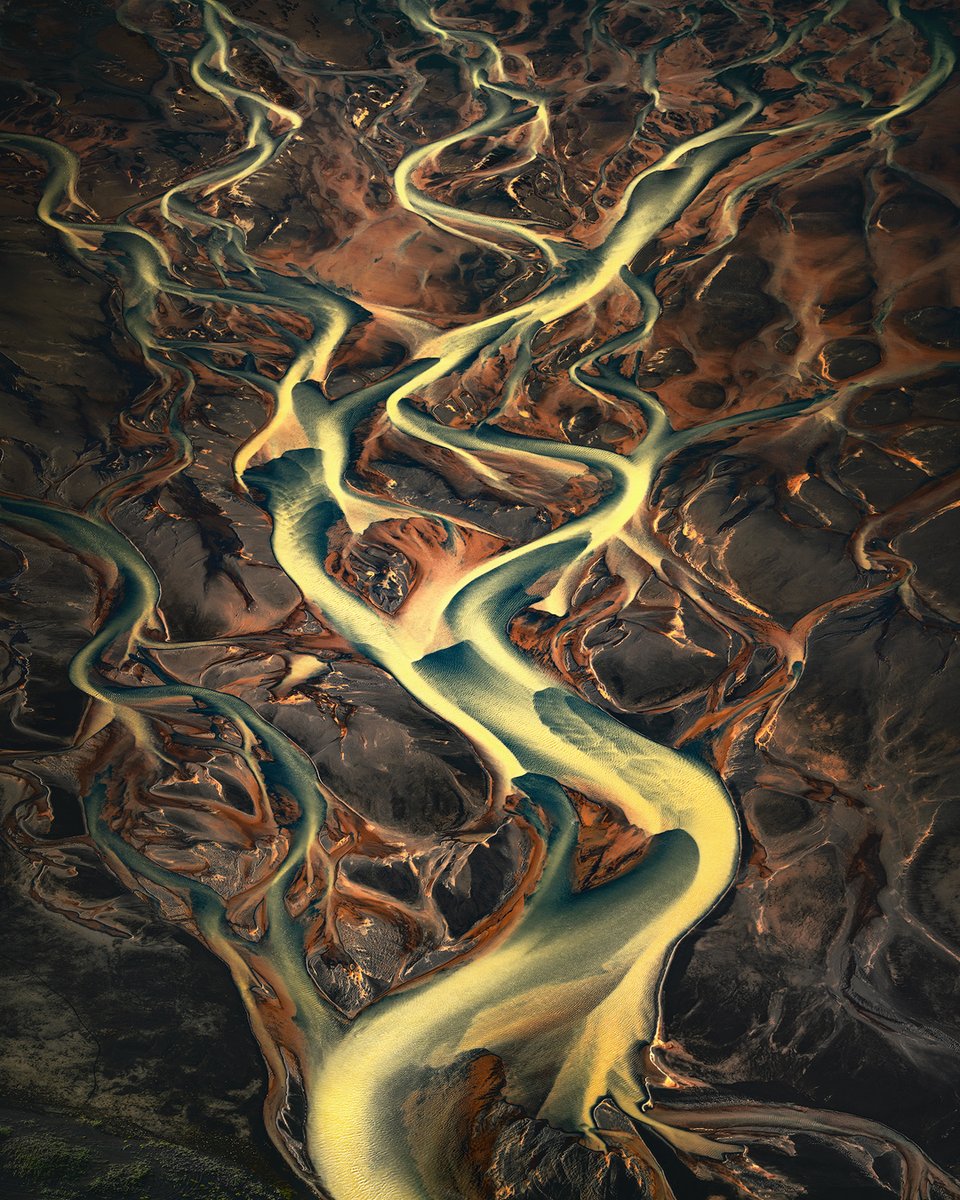 Glacial river in Iceland, photographed from the sky. 

The apparently predictable reality of Nature suddenly becomes absolutely surreal...