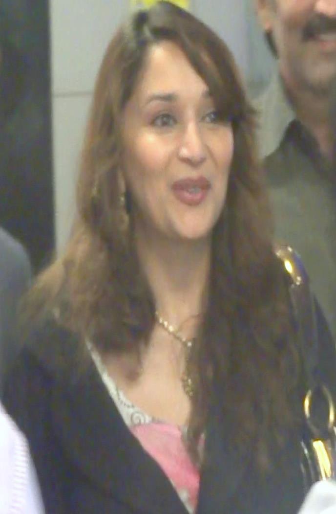 MadhuriEmpress's tweet photo. This Day, that year! We still can’t forget the day in 2011 when you shifted back to Mumbai! ❤️✨ What a blessing it is to have you around is something only your fans can express to you @MadhuriDixit ma’am!😇 https://t.co/0EsGMjcbL1