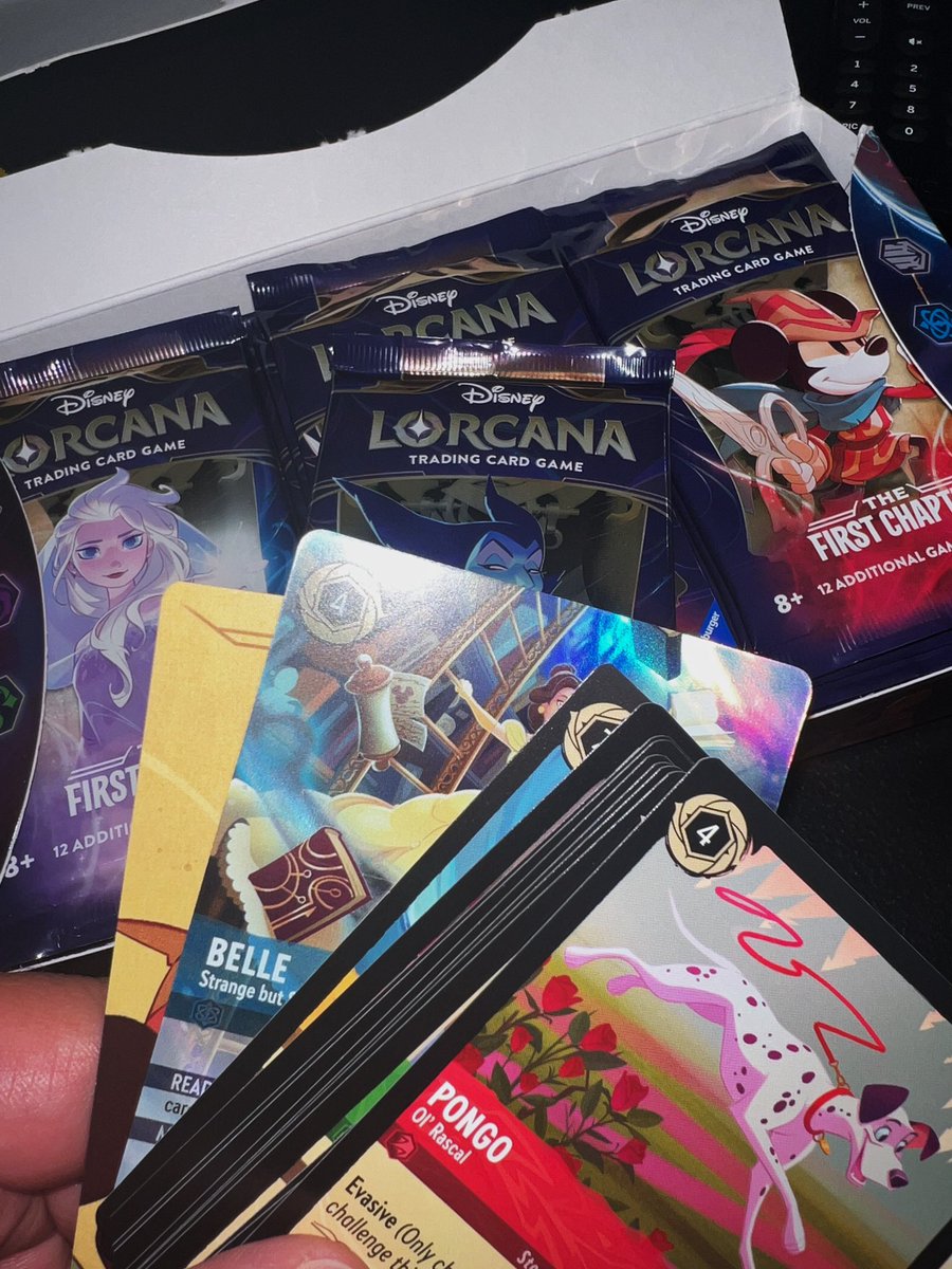 WYLDZARD's tweet photo. I got bored so I started to rip a Lorcana booster box...1st pack MAGIC! 😧🔥 It was "Strange but Special" 😅 

#Disney #Lorcana #Enchanted #Belle #FirstPackMagic #StrangeButSpecial https://t.co/5GK7mRNlJk