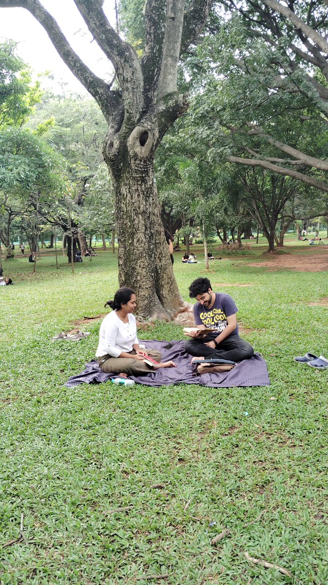 Here was our 39th Cubbon Reads, a serene October morning at Cubbon Park 🌳, soft soil, minty air, pale yellow butterflies 🦋, cherished readers on sheets, under tree trunks, and on grass 🌿. Newcomers shared about feeling a sense of belongingness in our silent reading initiative