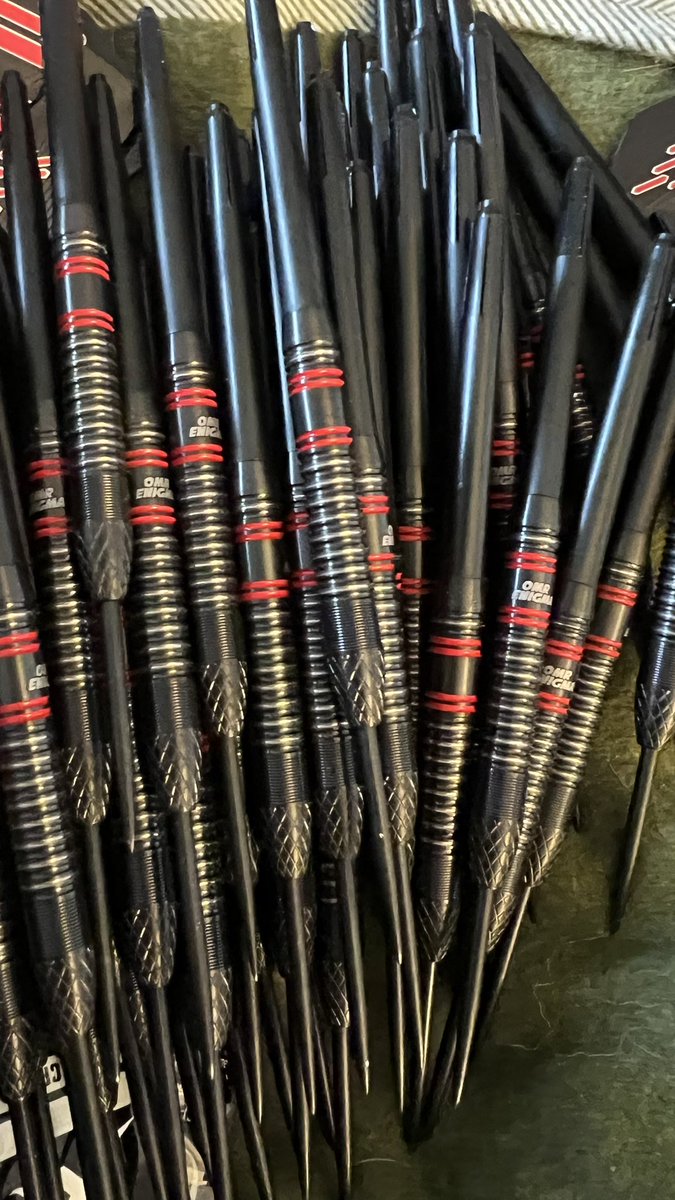 Only 50 sets made, 1 of which are mine 

Black with a touch of red and silver, design incorporates my favourite darts

24g - 90% Tungsten. 50mm length. 6.8mm width. Comes with stems, flights, leather pouch and a 3D printed dart stand in red/black

@Get_iTdarts #omrenigma #darts