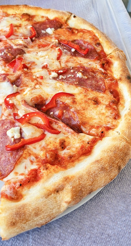 Val_BB's tweet image. Salami, feta, and pepper pizza from Bella Napoli in #Monolithos - so scrummy! 😋 #Santorini