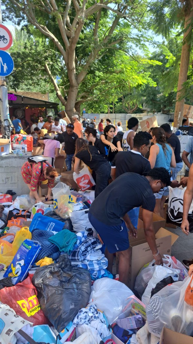 martinplaut's tweet photo. Eritreans in Israel collecting and transferring goods in Tel Aviv for  all those evacuated https://t.co/MVPLSiylWq