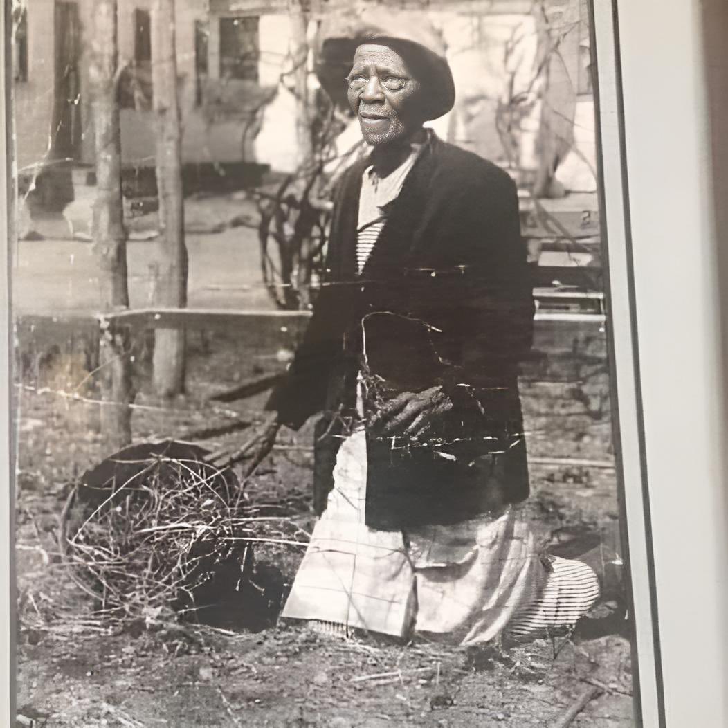 ““This is my great-grandma, Christina Levant Platt at age 100, weeding her garden. She was born into slavery. Her “owner” was a wife that taught my great grandma to read and write secretly, which was illegal and quite dangerous at that time for both of them. She learned to read