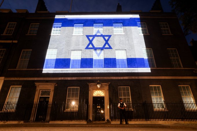 The Israeli flag illuminating Downing Street in solidarity with the people of Israel.