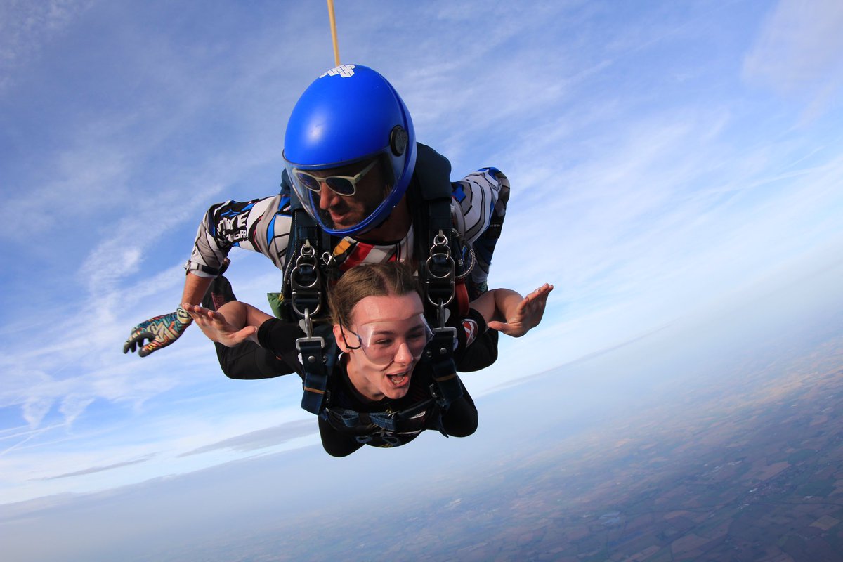 amyb17X's tweet photo. Repping the cov top from 14,000ft today🩵 
(the cardiff fan I was strapped to wasn’t best pleased) https://t.co/YjkjE1tj7C