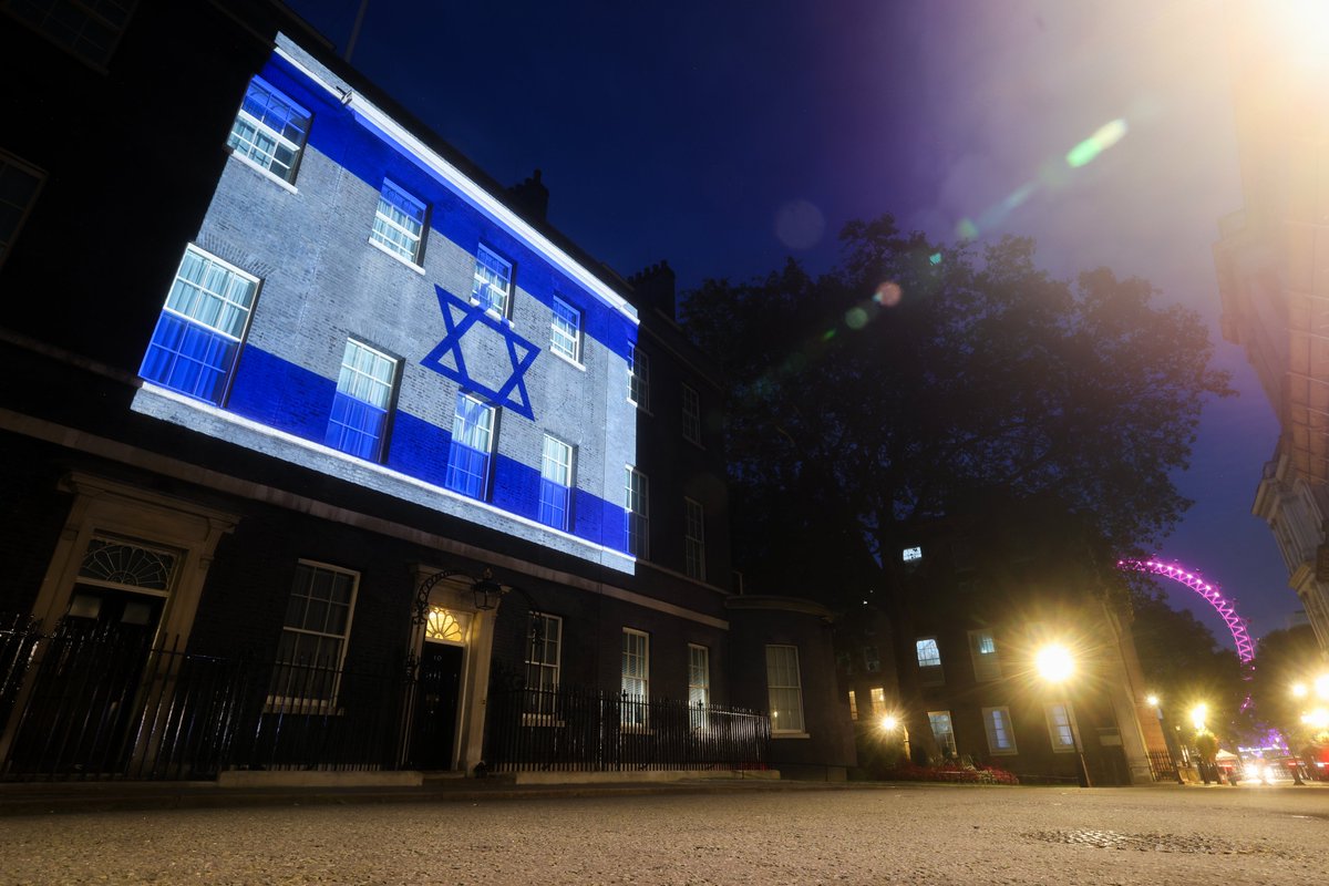 UK Prime Minister (@10downingstreet) on Twitter photo The Israeli flag shines on Downing Street tonight in solidarity with the people of Israel. 
We stand with 🇮🇱 The Israeli flag shines on Downing Street tonight in solidarity with the people of Israel. 
We stand with 🇮🇱