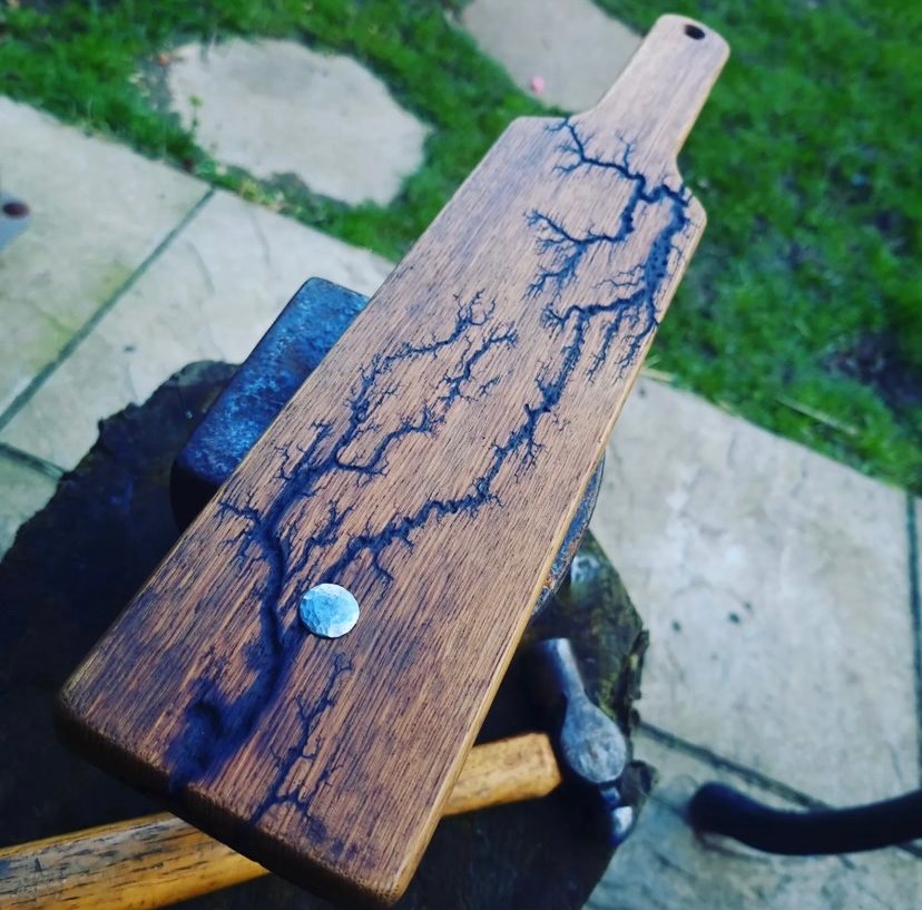 Ironoak13's tweet photo. Half an ounce of steel rivet through the business end of a reclaimed oak fractal burned paddle. O 
#spanking #paddle #bdsm #impact #impactplay #discipline #kink #fractalburning #lichtenbergfigure #lightning #highvoltage https://t.co/rYXu8JzwSn