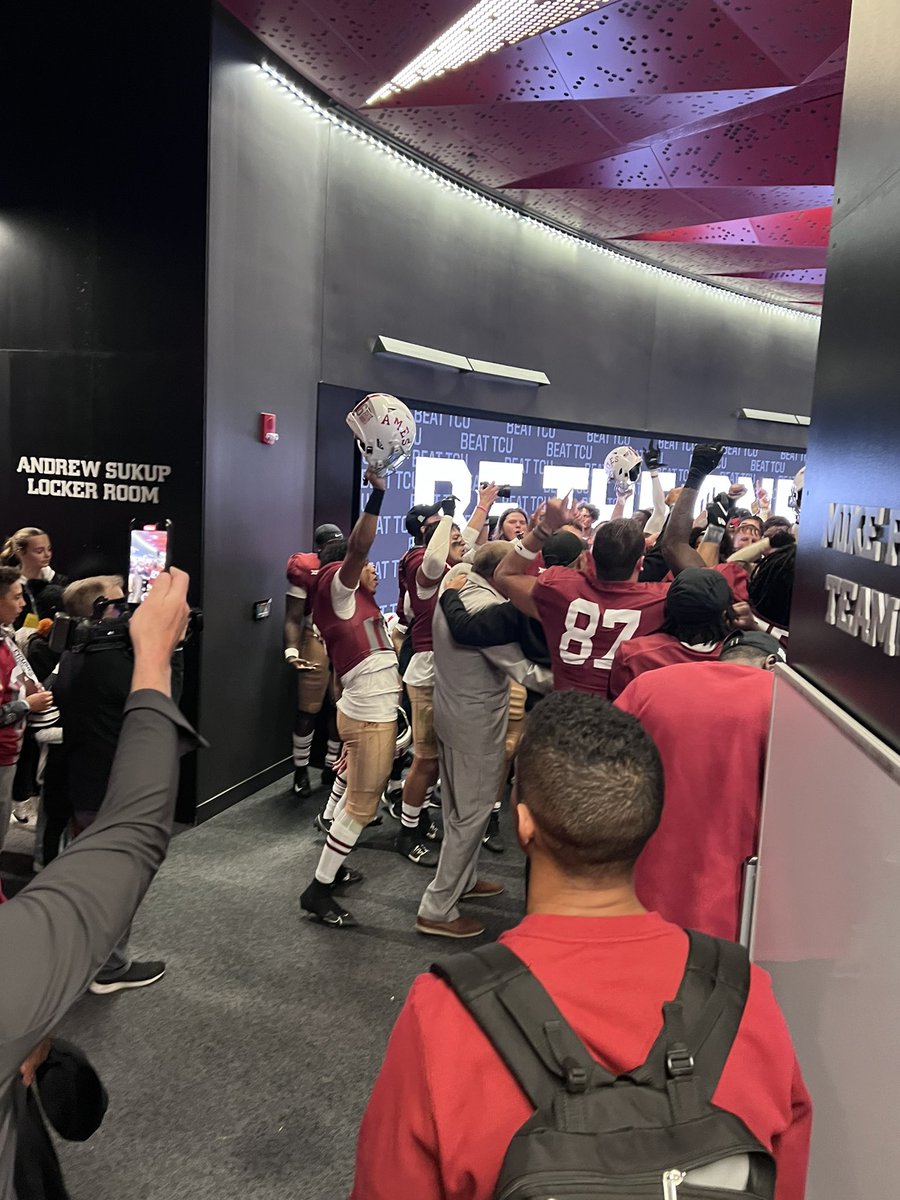 Coach McCarney starting the fight song with coach Campbell in the locker room after the game was such a great moment.