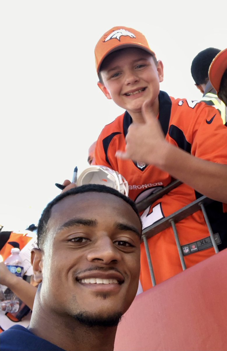 jessarend's tweet photo. When your favorite Bronco takes a selfie with your phone…day, month and year made!! 💙🧡🐴🏈@PatSurtainll #ourfave #gobroncos #2 https://t.co/xBt1SjQEKq