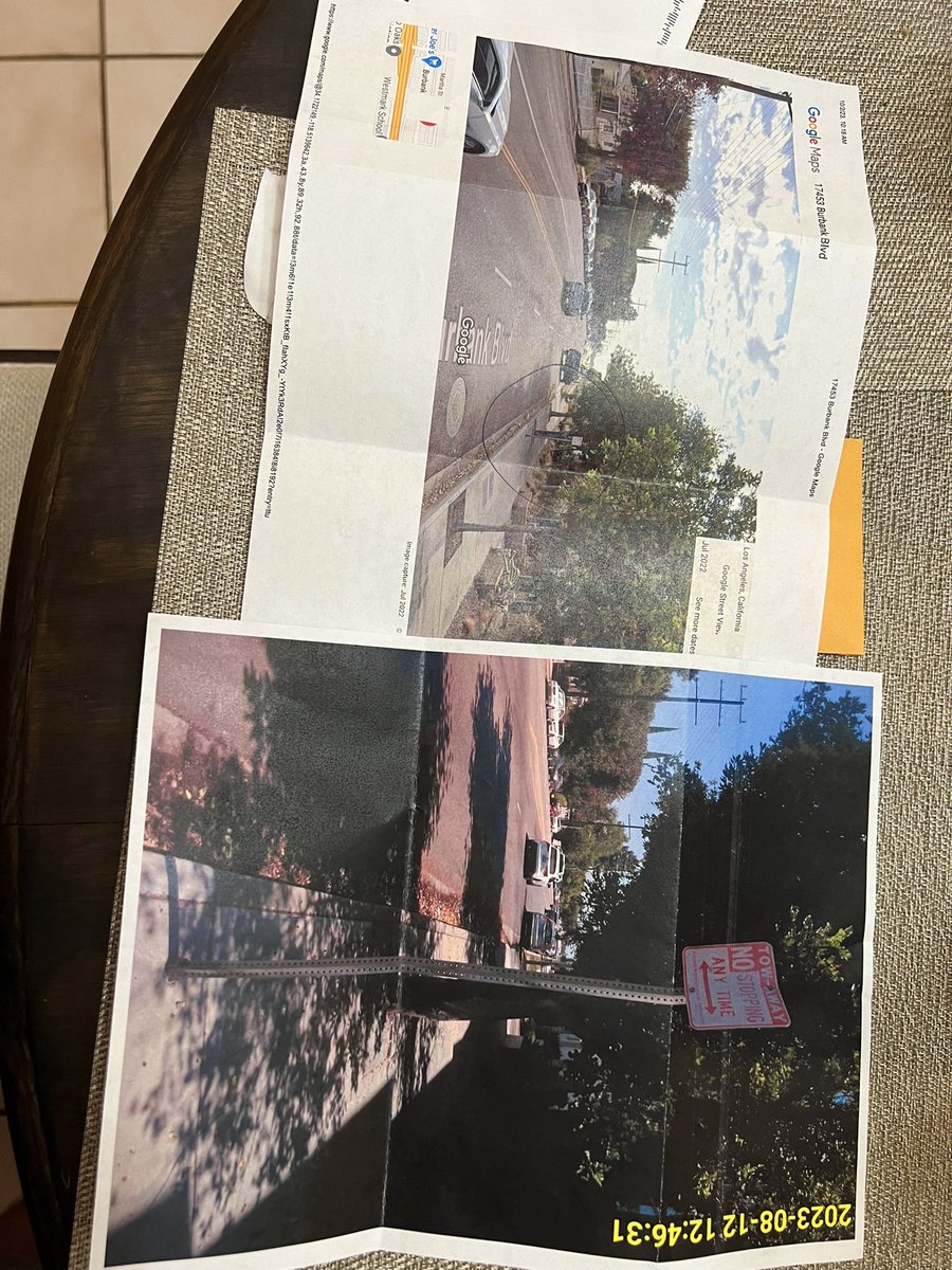 KevinTHoffman's tweet photo. @KarenBassLA @LACity @LADOTofficial Hey thanks for this parking ticket, you can’t even send us the right photos for the parking violation. I’m very disappointed that I voted for you especially because of these new, non-visible parking signs. 

@LaInaMinute https://t.co/xXwtGbxLJB