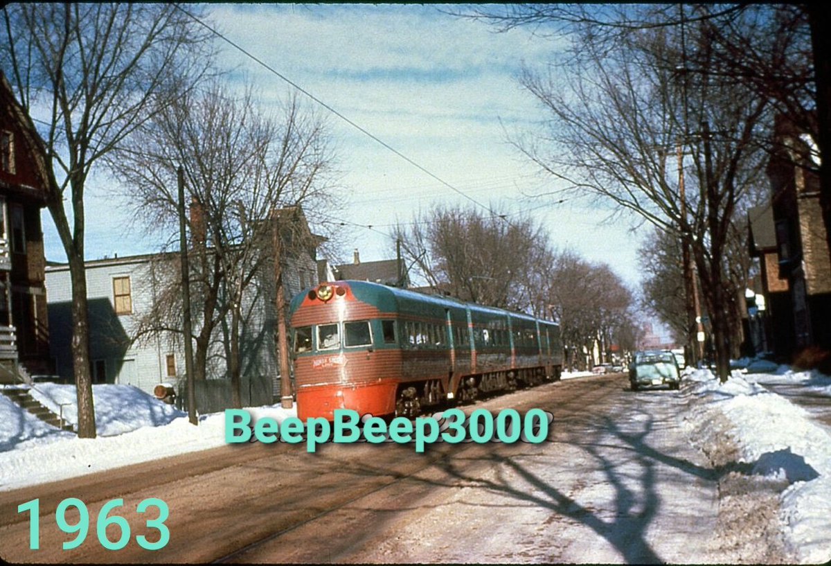 Chicago, North Shore & Milwaukee Railroad Electroliner #802 on S. 5th St., south of W. Lapham St. on Milwaukee's South Side.

Looking North

This area completely changed when I-94 was built in the late 1960's.

Lapham between 1st & 16th became a boulevard at the same time.