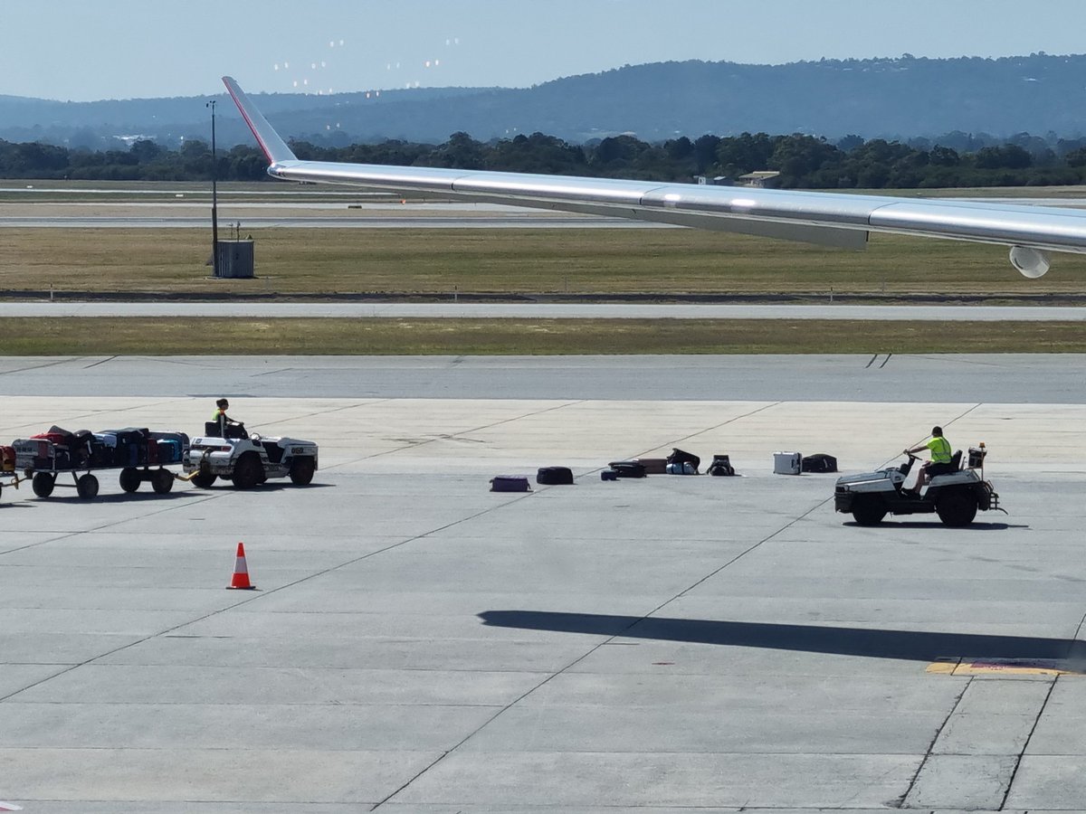 telliottaus's tweet photo. @Qantas not sure these bags belong on the tarmac.... @PerthAirport https://t.co/UbOzaED3oP