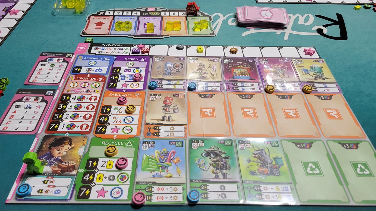 Raising Robots by <a href="/NauvooGames/">Nauvoo Games</a>  Very charming homages to many scientists throughout the eras, but they're building super sweet robots. The easiest shorthand to explain this game is a mix between Race for the Galaxy and Wingspan.