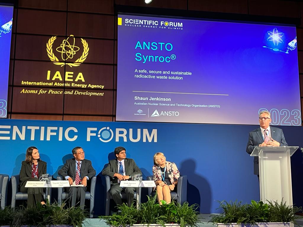 ANSTO's tweet photo. At the @iaeaorg general conference this week CEO Shaun Jenkinson presented on ANSTO Synroc®, a sustainable &amp; low-risk nuclear waste treatment technology suitable for advanced reactor fuel, fuel re-processing, actinide &amp; #SMR wastes @AusAmbVIE 
https://t.co/IbvCOrZ9nV https://t.co/BdkmKQdhyp