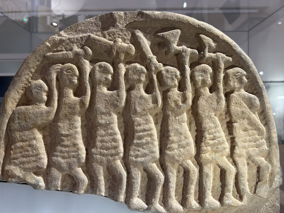 One side of a 10C grave marker, on display at Lindisfarne Priory Museum, Northumberland. Possibly depicting Viking warriors, weapons aloft? #ReliefWednesday
