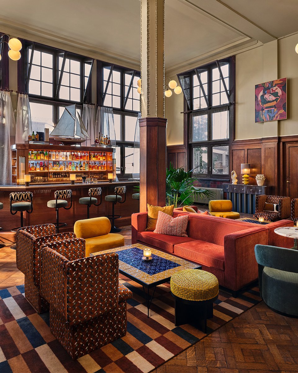 MixInteriors's tweet image. The Hoxton revitalizes a century-old landmark in Amsterdam&apos;s Eastern Docklands. Teaming with @AIME Studios &amp;amp; Nicemakers, they blend Art Deco charm with modern Amsterdam vibes, showcasing original stained-glass windows amidst bold patterns. 

🏛️✨#DesignFusion #AmsterdamDocklands