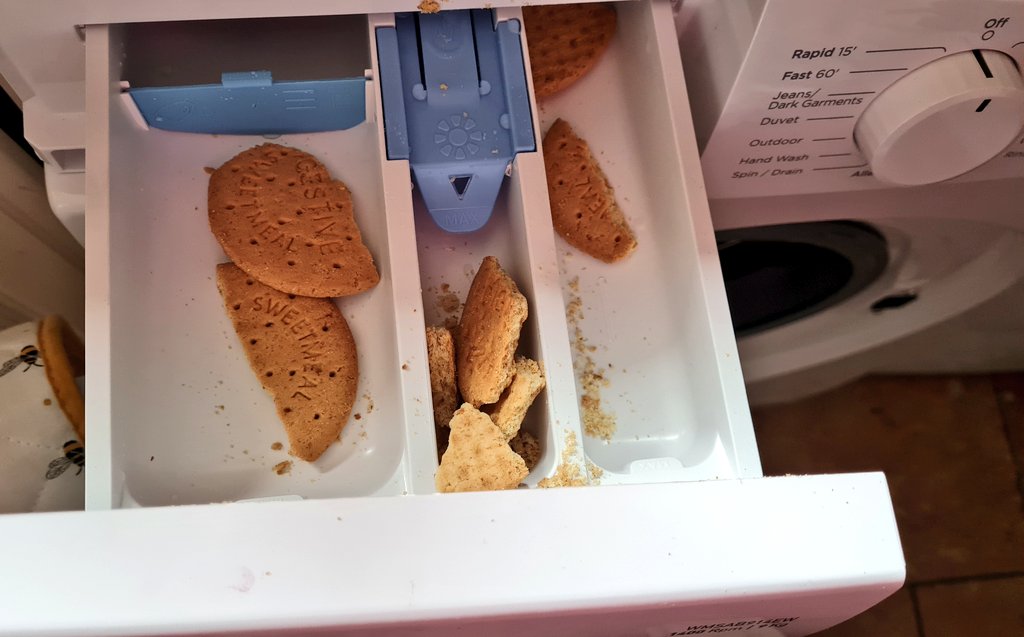 Discovered the toddler is using the washing machine drawer as a personal biscuit storage system
