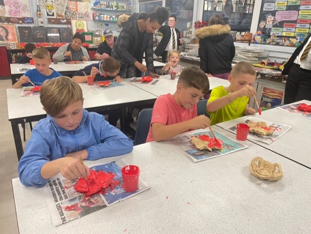 We invited our Y5/6 visitors to paint a poppy during open evening and we even had some parents joining in too. Watch this space to see how the final installation looks when its all finished! #art #ceramics #paulcummingsceramics @sacatholicacademy @staca_pastoral