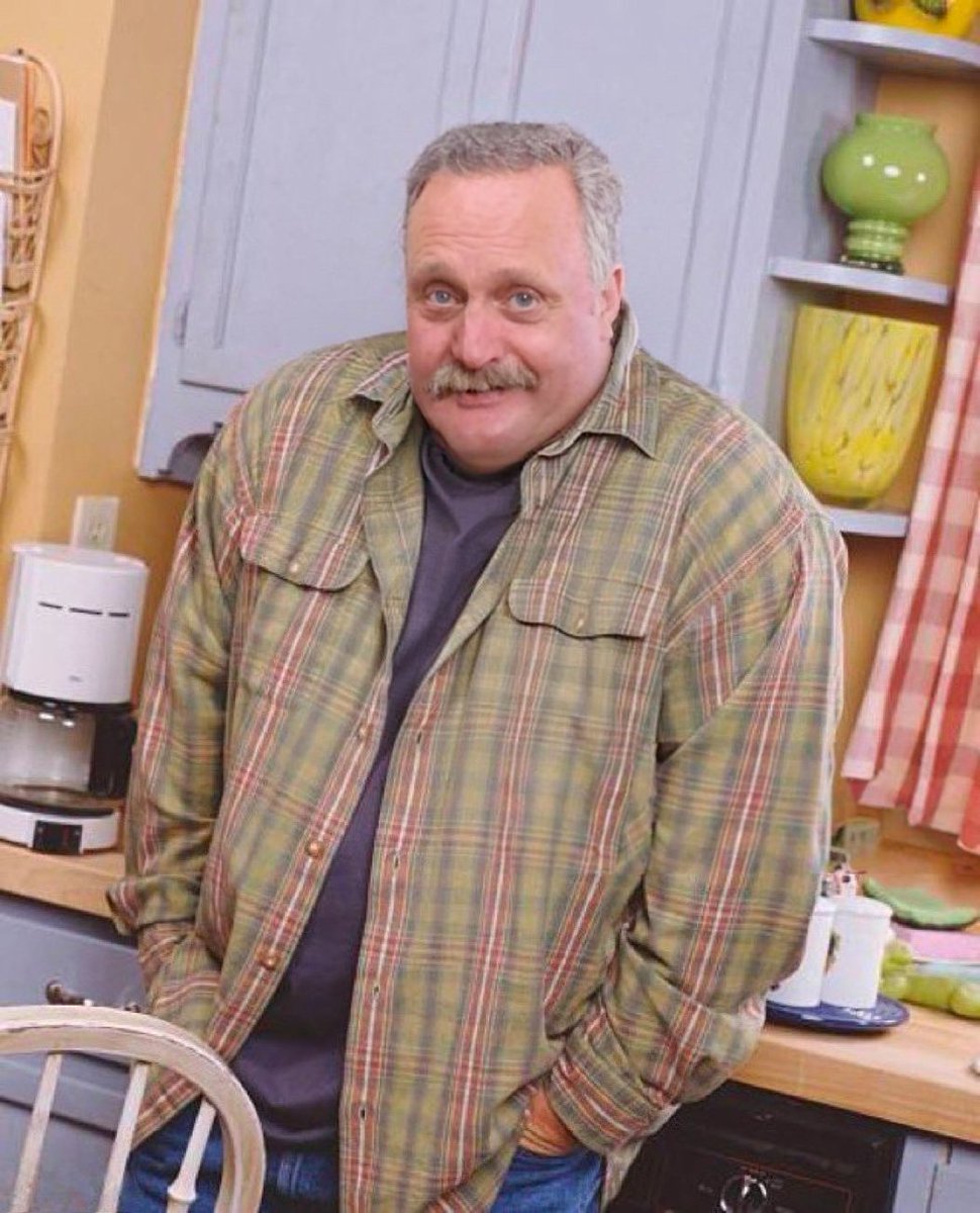 Peter Neururer gerade vor der Schalker Geschäftsstelle